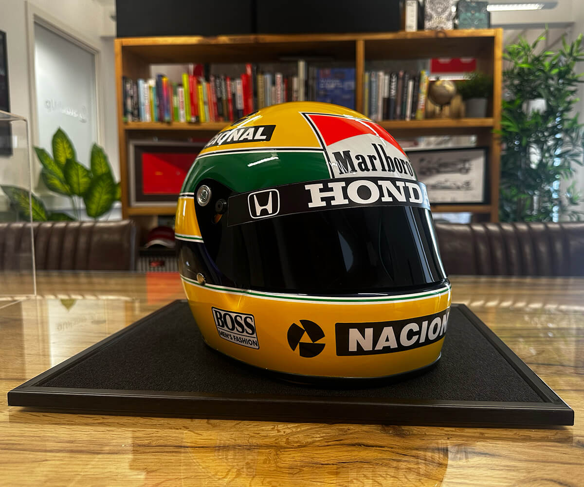 Ayrton Senna Helmet Design on a Table at the StackUp Digital Office